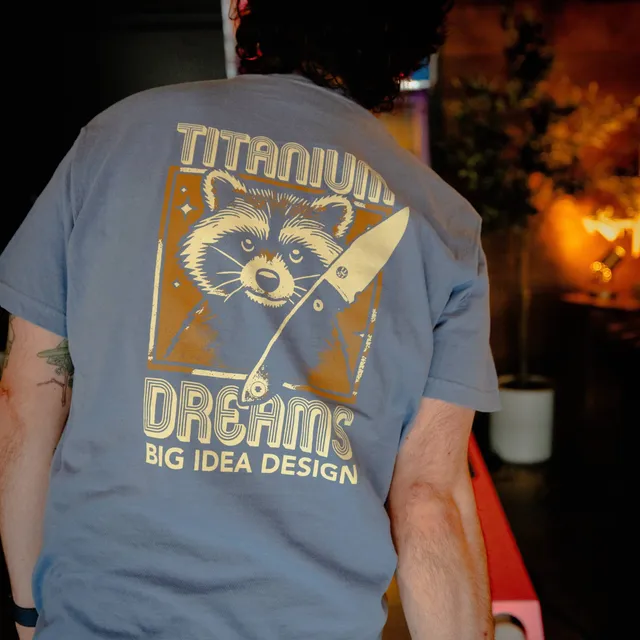bigidesign-merch-titanium-dreams-pocket-tee-t-shirt image 1