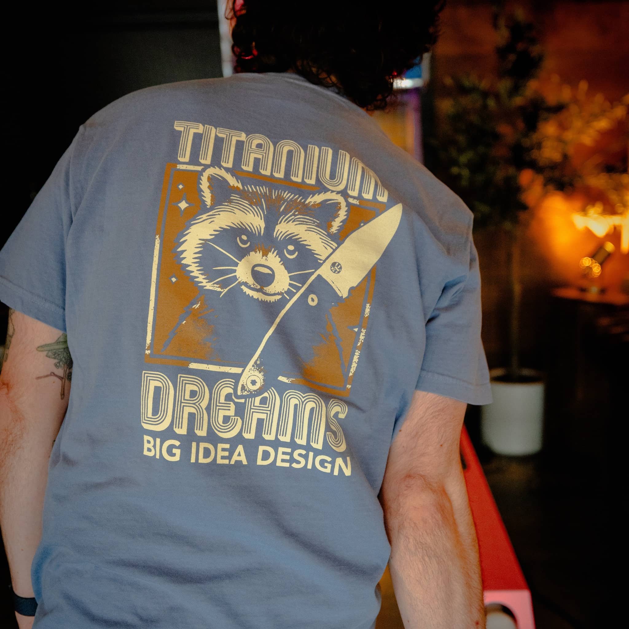bigidesign-merch-titanium-dreams-pocket-tee-t-shirt image 1