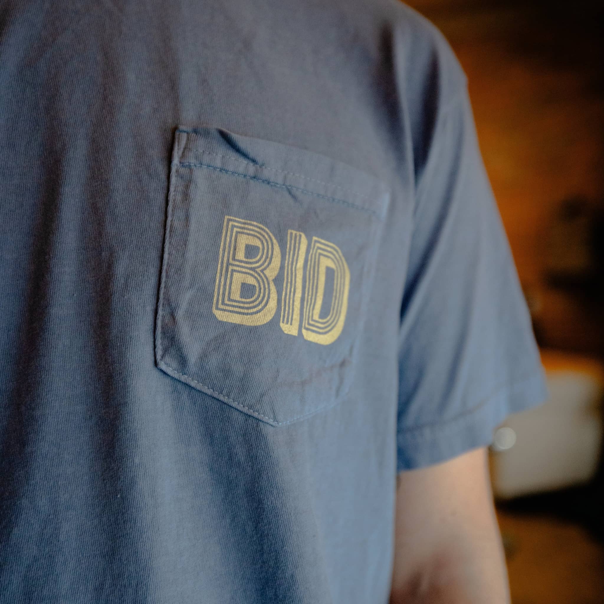 bigidesign-merch-titanium-dreams-pocket-tee-t-shirt image 2